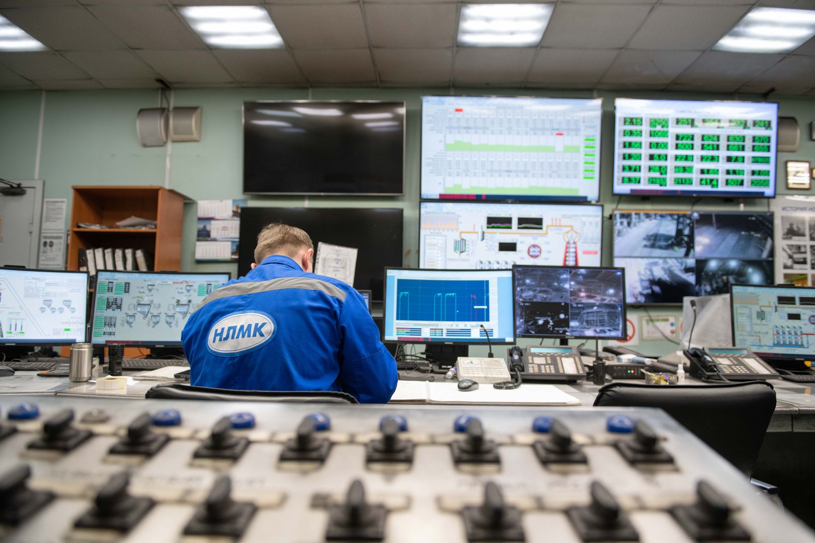 Mission control team operating tactical monitoring systems